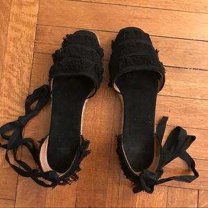Black flat fringe espadrilles from Castañer